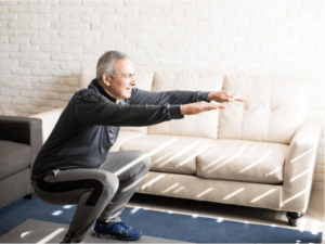 Mężczyzna robi przysiad